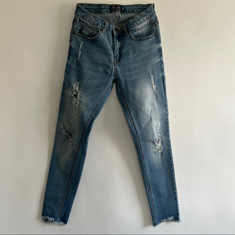 Distressed skinny mid rise jeans size 5